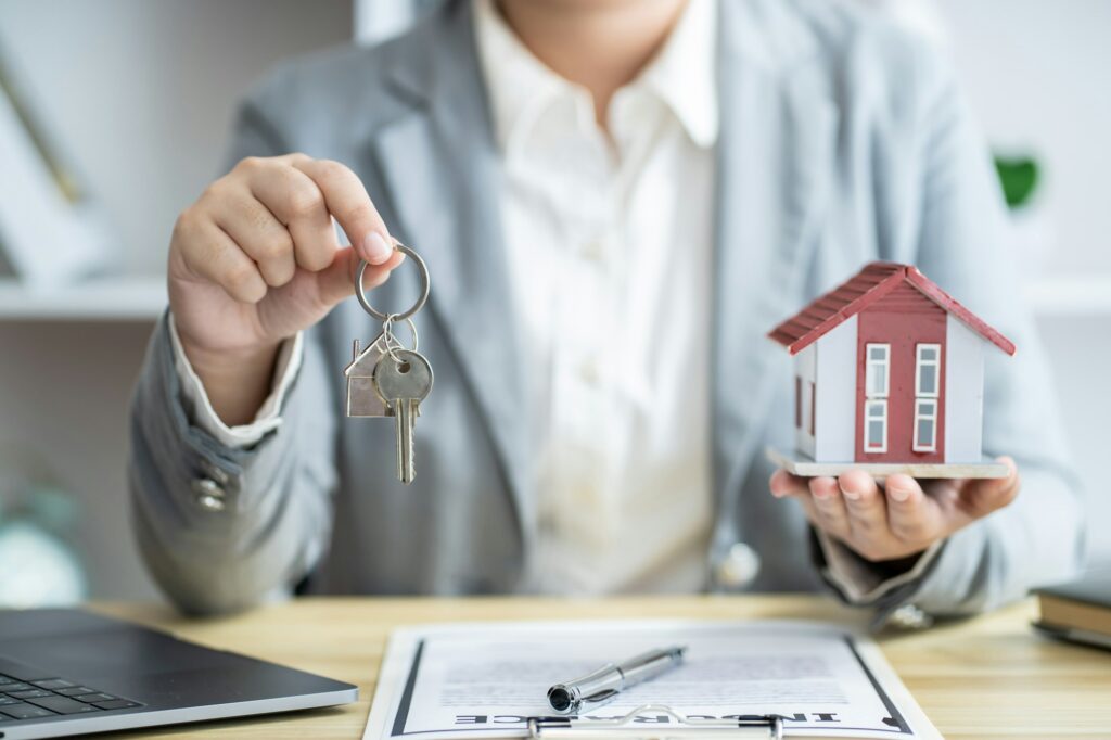 Business people signing contract making deal with real estate agent